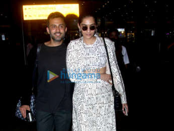 Sonam Kapoor Ahuja, Anand Ahuja, Karan Johar and others snapped at the airport