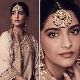 Sonam Kapoor sports an ethereal ivory Anamika Khanna costume that perfectly embodies the "opulent" dress code